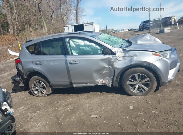 2T3RFREV1GW490842 2016 TOYOTA LE Серебряный Вид панели приборов