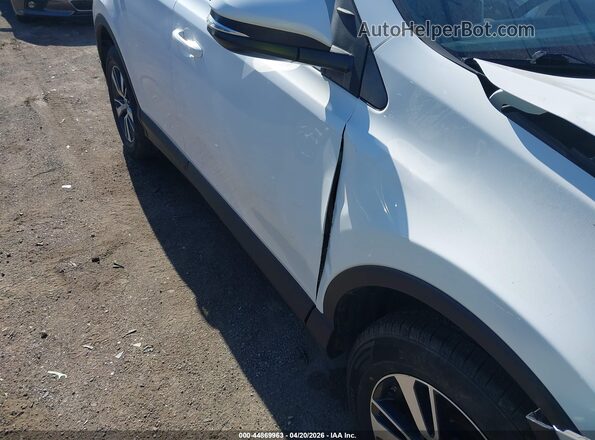 2T3RFREV6JW806310 2018 TOYOTA LE White 