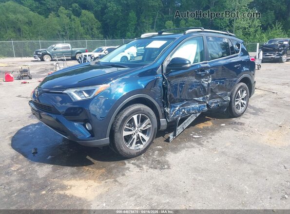 2T3RFREV6JW836827 2018 TOYOTA LE Teal Առջևի ձախ երեք քառորդ տեսարան