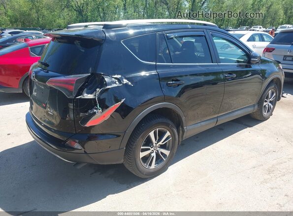 2T3RFREV7JW737076 2018 TOYOTA LE Black Rear right