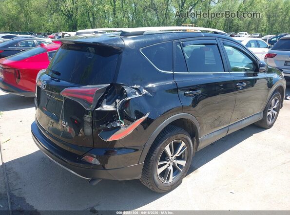 2T3RFREV7JW737076 2018 TOYOTA LE Black Front view