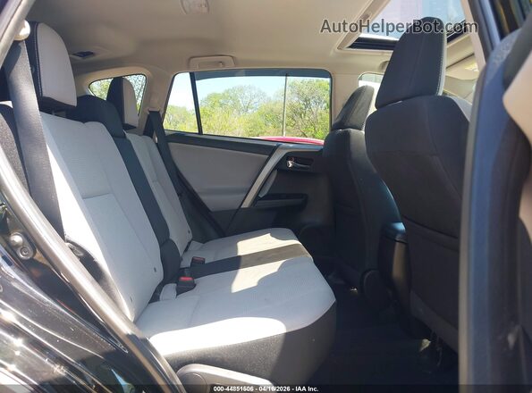 2T3RFREV7JW737076 2018 TOYOTA LE Black VIN sticker view