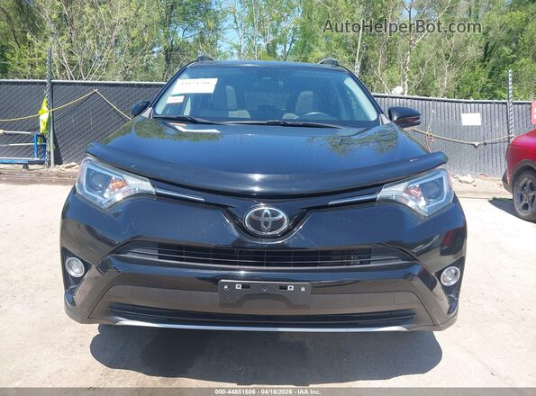 2T3RFREV7JW737076 2018 TOYOTA LE Black Rear interior view
