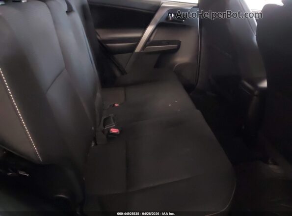 2T3RFREV8JW703552 2018 TOYOTA LE Black VIN sticker view