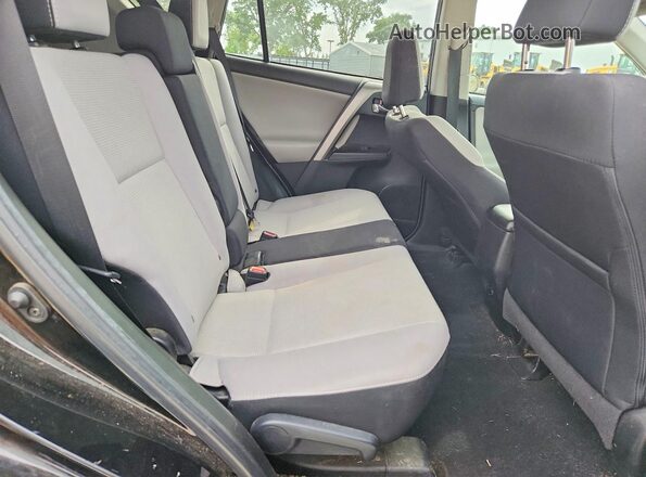 2T3WFREV2JW430935 2018 TOYOTA LE Black Vista de los asientos traseros