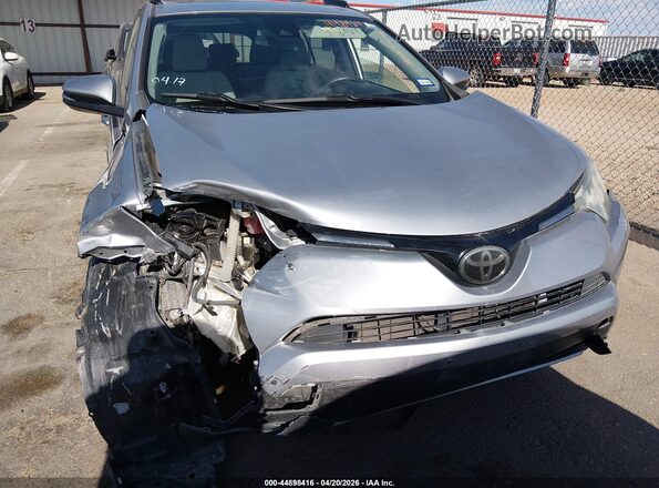 2T3WFREV6JW418075 2018 TOYOTA LE Серебряный 