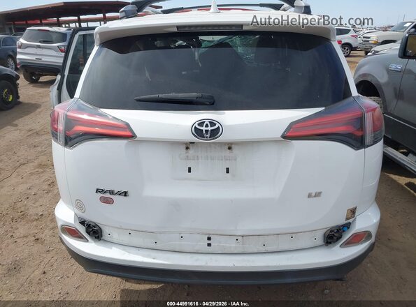 2T3ZFREV2GW261912 2016 TOYOTA LE White 
