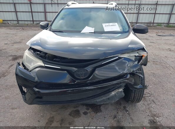 2T3ZFREV8GW280674 2016 TOYOTA LE Black Widok z przodu