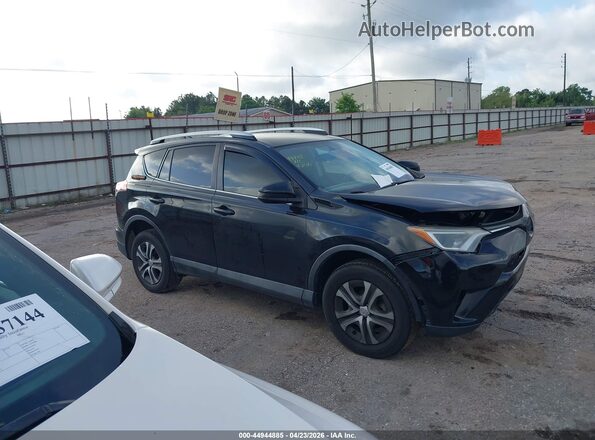 2T3ZFREV8GW280674 2016 TOYOTA LE Black Widok wnętrza z tyłu
