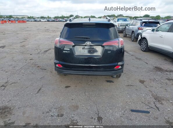 2T3ZFREV8GW280674 2016 TOYOTA LE Black 