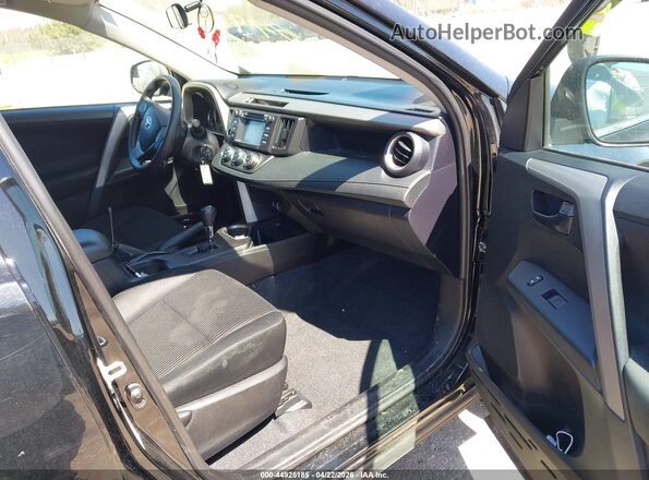 2T3ZFREVXGW305140 2016 TOYOTA LE Black Widok wnętrza z przodu
