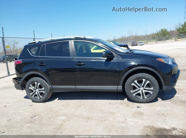 2T3ZFREVXGW305140 2016 TOYOTA LE Black Widok wnętrza z tyłu