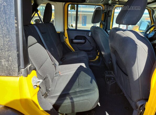 1C4HJXDN4JW318975 2018 JEEP WRANGLER Yellow Widok wnętrza z tyłu
