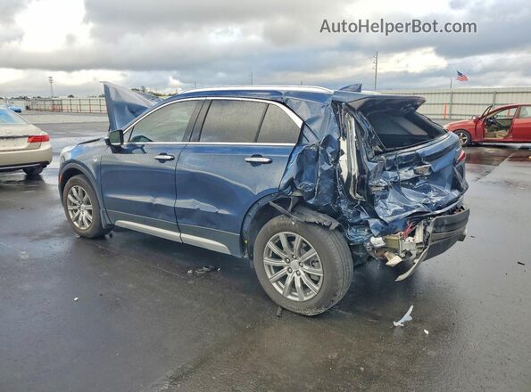 1GYFZCR43MF028086 2021 CADILLAC XT4 Blue Rear right
