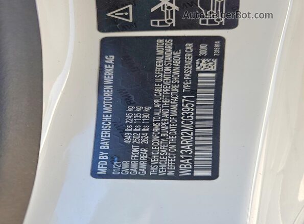 WBA13AR02MCG39571 2021 BMW M4 White VIN sticker view