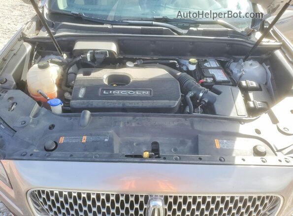 2LMPJ6K92KBL18911 2019 LINCOLN NAUTILUS Tan VIN կոդի պիտակի տեսք