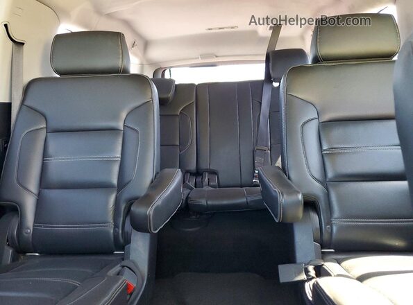 1GKS1HKJ6JR224689 2018 GMC YUKON Черный Вид задней части салона