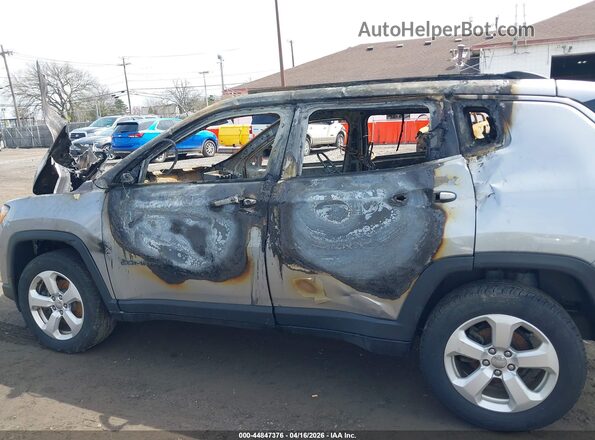 3C4NJDBB0KT850709 2019 JEEP COMPASS Серебряный Вид задней части салона