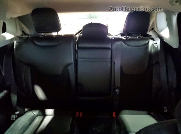 3C4NJDBBXJT270656 2018 JEEP COMPASS Black Rear seats view