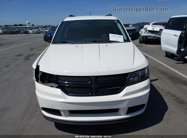 3C4PDCAB9JT534624 2018 DODGE JOURNEY White Widok wnętrza z tyłu