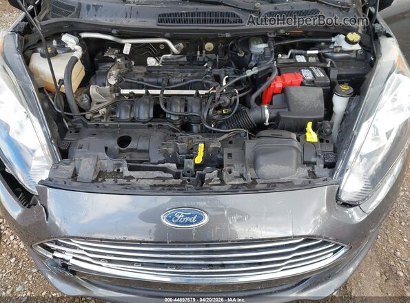 3FADP4BJ3JM126223 2018 FORD FIESTA Gray Rear view