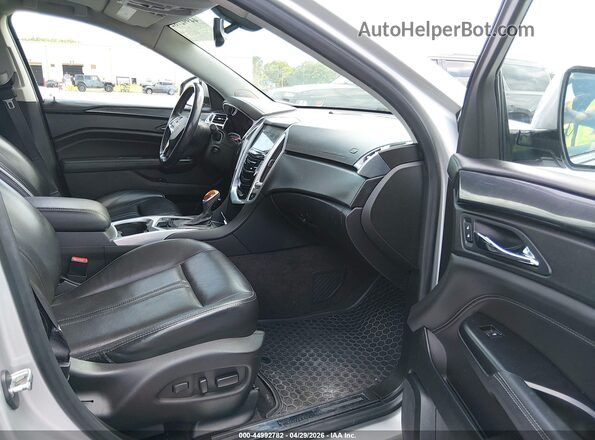 3GYFNCE36GS563244 2016 CADILLAC SRX Серебряный Вид салона спереди