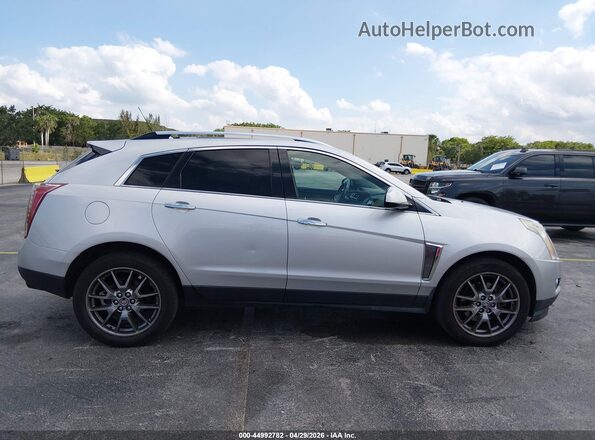 3GYFNCE36GS563244 2016 CADILLAC SRX Серебряный Вид задней части салона