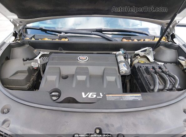 3GYFNCE36GS563244 2016 CADILLAC SRX Серебряный Вид сзади