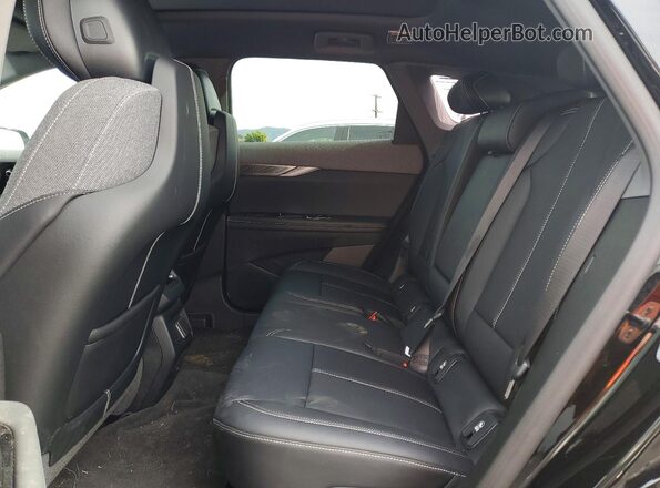 3GYK3EMR3SS185947 2025 CADILLAC OPTIQ Черный Вид задней части салона