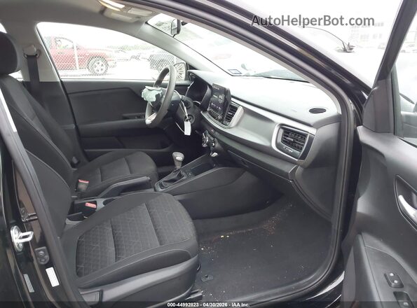 3KPA24AD4PE613649 2023 KIA RIO Black Vista interior delantera