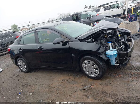 3KPA24AD8ME424062 2021 KIA RIO Black Rear interior view