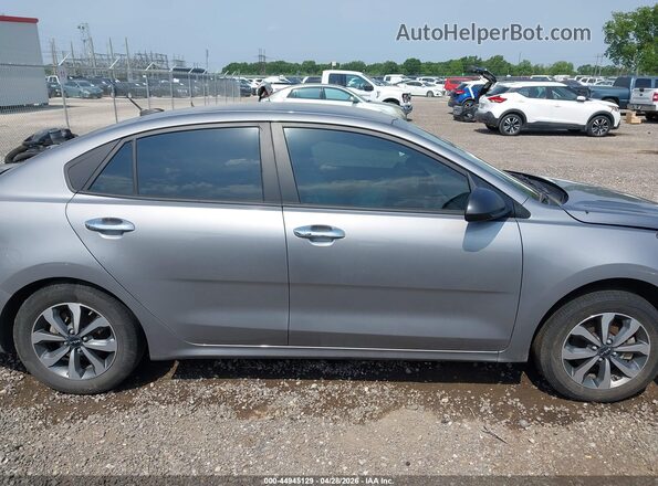 3KPA24AD9PE612979 2023 KIA RIO Серебряный Вид задней части салона
