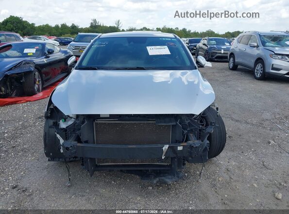 3KPF34AD3KE020344 2019 KIA FORTE Silver Սալոնի հետևի տեսք