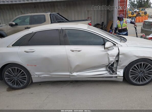 3LN6L2LU0GR629033 2016 LINCOLN MKZ HYBRID Silver Widok wnętrza z tyłu