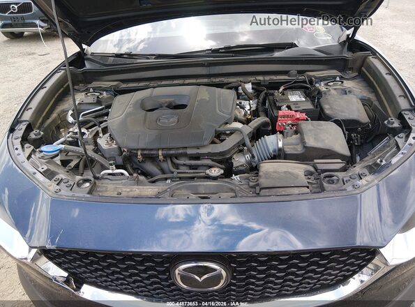 3MVDMBCM7RM690645 2024 MAZDA CX-30 Blue Rear view