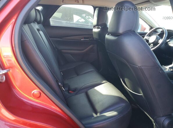 3MVDMBDL2MM319830 2021 MAZDA CX-30 Red Rear seats view