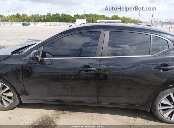 3N1AB8CV7MY246272 2021 NISSAN SENTRA Black Rear interior view