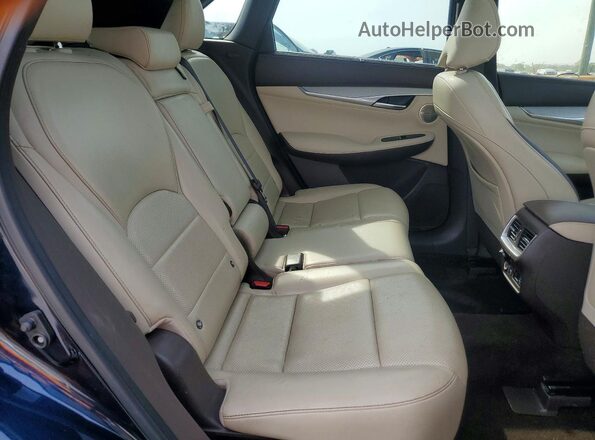 3PCAJ5M10KF145240 2019 INFINITI QX50 Blue Rear seats view