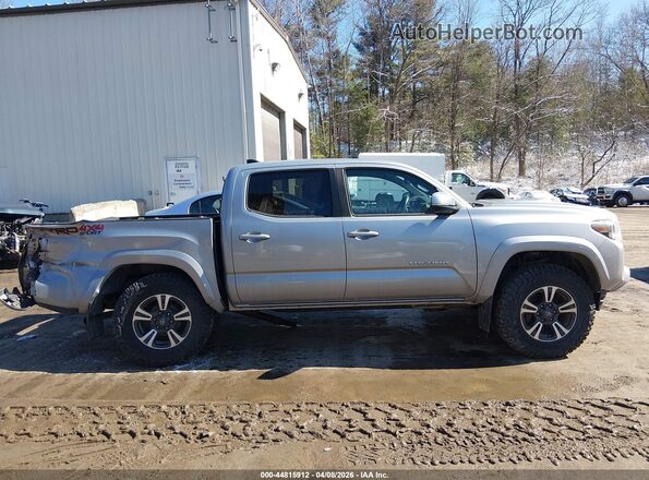 3TMCZ5AN0KM192076 2019 TOYOTA TACOMA Silver Rear interior view