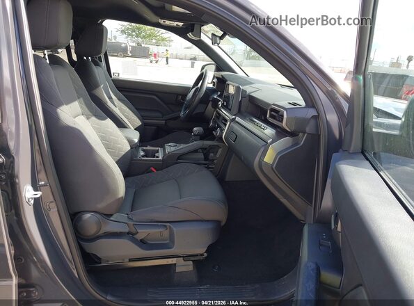 3TMKB5FN1SM043006 2025 TOYOTA TACOMA Gray Front interior view