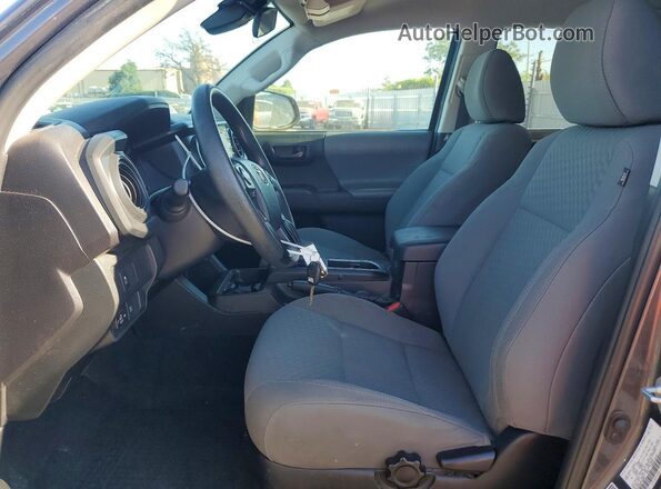 3TYAX5GN0PT086064 2023 TOYOTA TACOMA Charcoal Front interior view