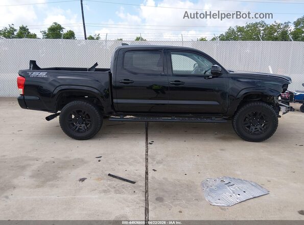 3TYAX5GN9NT044988 2022 TOYOTA TACOMA Black Вид задньої частини салону
