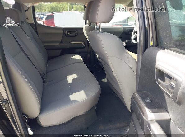 3TYAX5GN9NT063413 2022 TOYOTA TACOMA Black Vista de la etiqueta del VIN