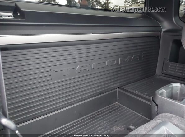 3TYJDAKN7ST014697 2025 TOYOTA TACOMA White Вид наклейки з VIN-кодом