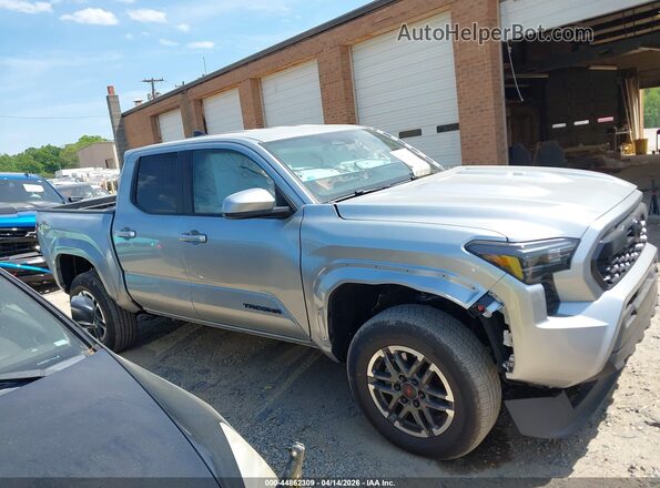 3TYLC5LN7TT052725 2026 TOYOTA TACOMA HYBRID Silver Vista interior trasera