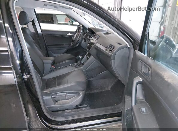 3VV2B7AX0LM058183 2020 VOLKSWAGEN TIGUAN Black Front interior view
