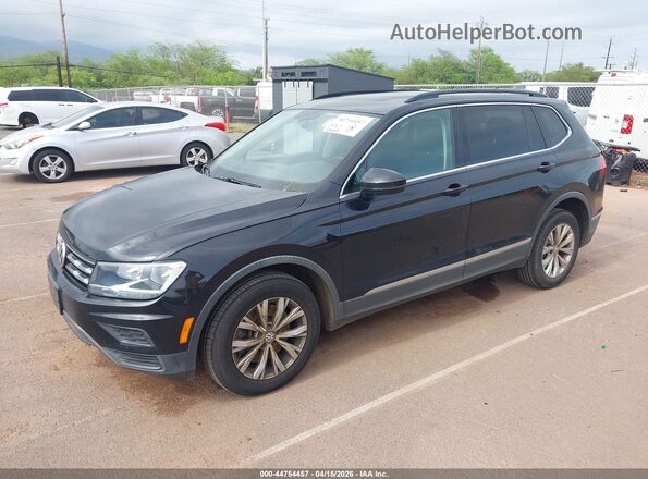 3VV2B7AX6JM088284 2018 VOLKSWAGEN TIGUAN Black Przód lewy