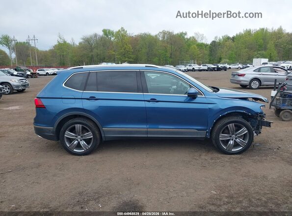 3VV2B7AX7LM158555 2020 VOLKSWAGEN TIGUAN Light Blue Rear interior view