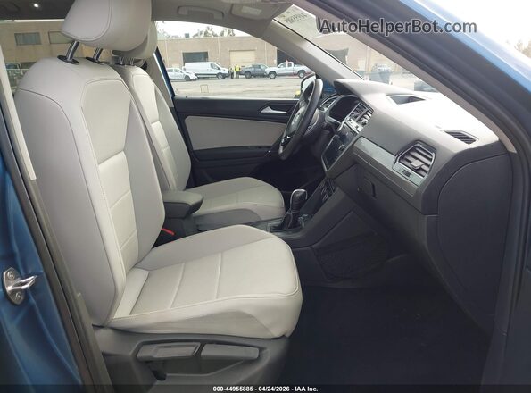 3VV3B7AX3LM006101 2020 VOLKSWAGEN TIGUAN Blue Front interior view