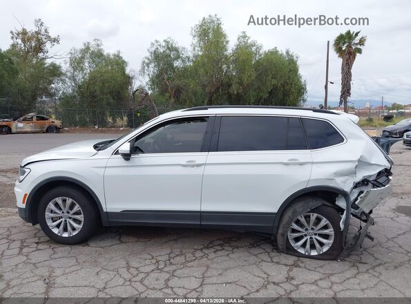 3VV3B7AX4KM049084 2019 VOLKSWAGEN TIGUAN White Widok wnętrza z tyłu